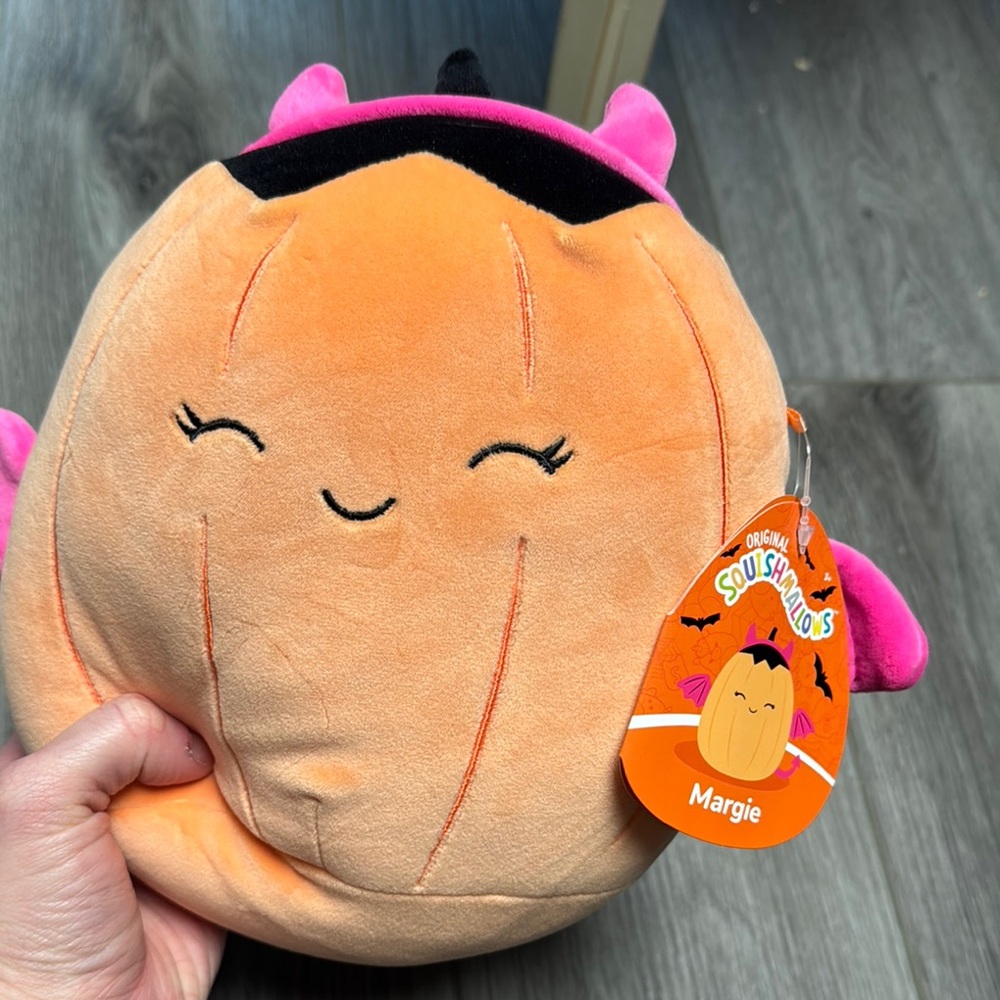 Smiling Orange Plush with Pink Accents